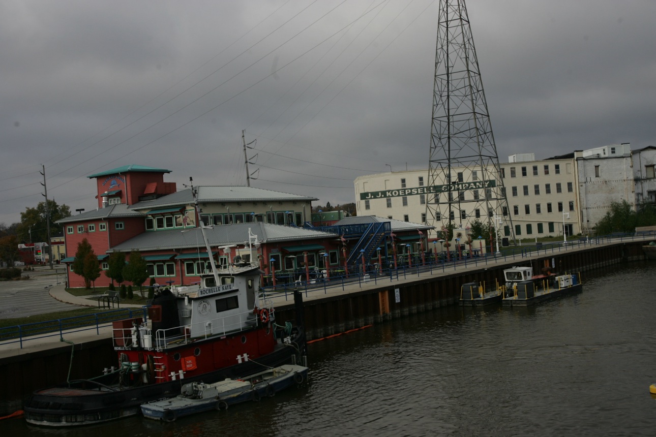 Tugboat ROCHELLE KATE at the working riverfront, J.J. Koepsell Company building