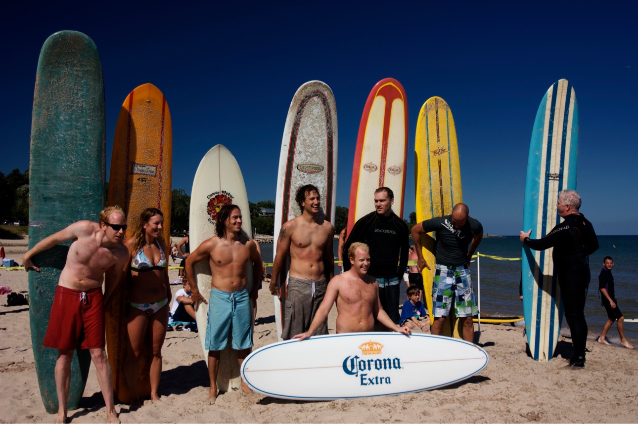Surfers posing with their boards at the Dairyland Surf Classic