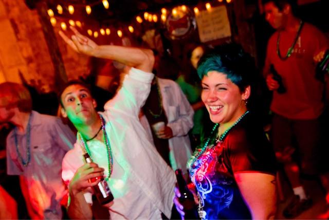 Mardi Gras night, beads, dancing