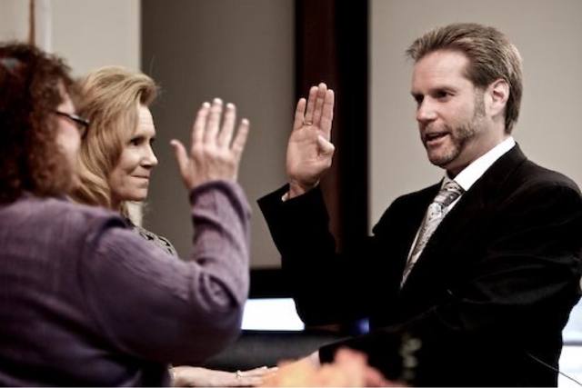 **Bob Ryan** taking the oath of office as the 53rd mayor (April 20, 2009 – March 5, 2012; recalled; died July 1, 2021