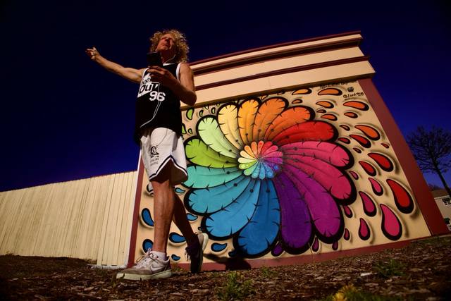 Mike at the rainbow flower mural