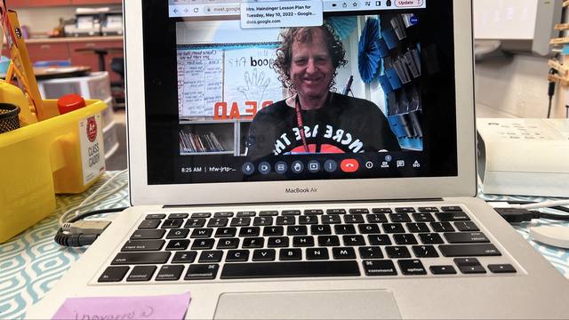 Mike on Google Meet on a MacBook Air ("Mrs. Hainzinger Lesson Plan" tab, 8:25 AM
