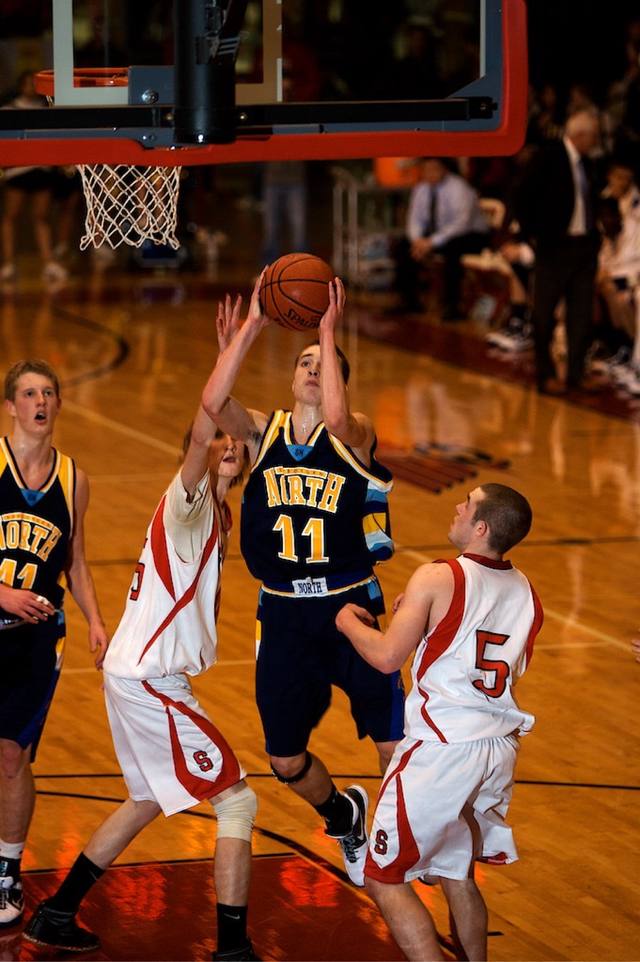 North 11 shooting over South defenders